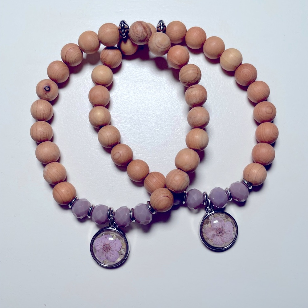 NWT Barbara King Set of 2 Sandalwood Bracelets with Flower Charm Purple